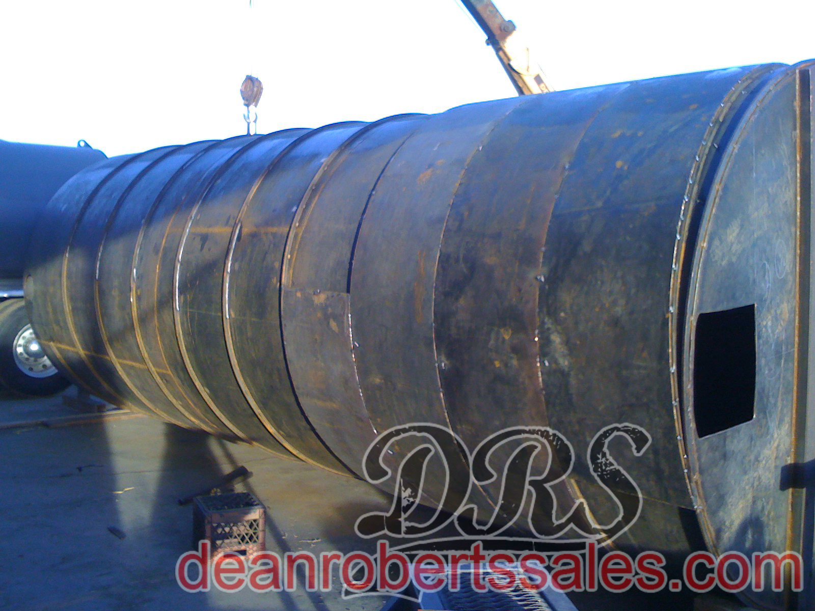 CUSTOM SPECIALTY SEALCOAT TANKS TRUCKS AND HELICAL MIXERS BY DEAN ROBERTS SALES.
